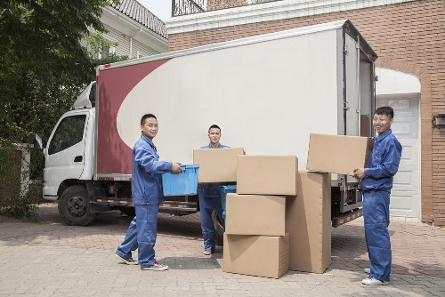 Employees reviewing ethical labour compliance documents for modern slavery prevention