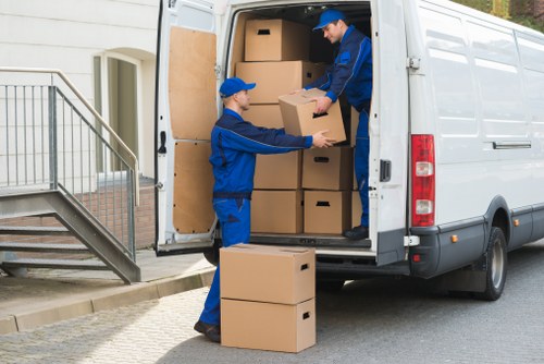 Packed moving boxes and furniture protection for a Crayford removals job