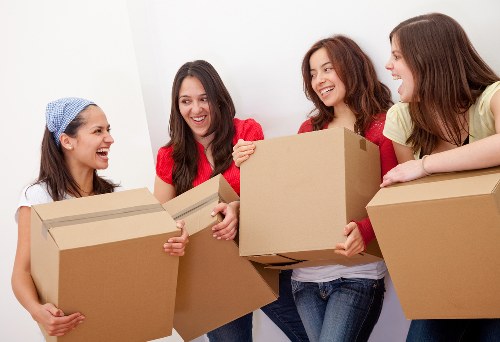 Careful wrapping and boxing of household items during a move