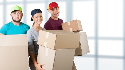 Local crew loading office furniture for pick-up in Crayford