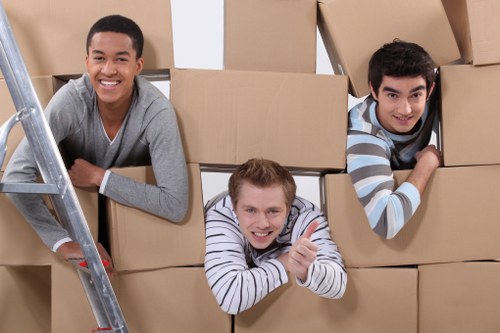 House movers transporting furniture with care during a Crayford relocation