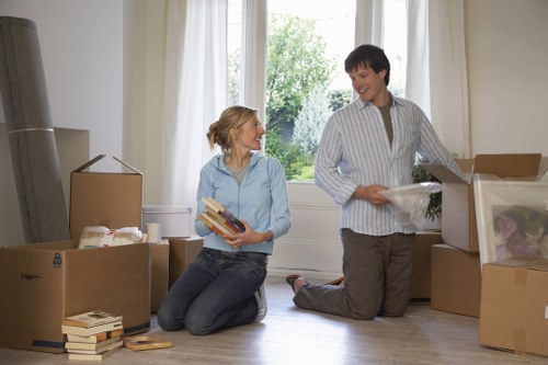 Careful loading of household items into a moving van