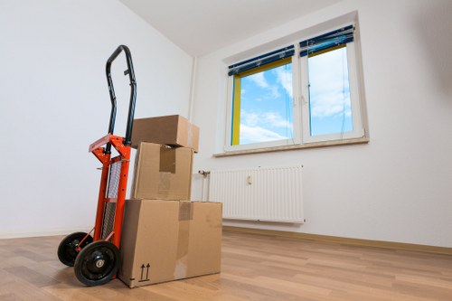 Prepared moving boxes and furniture ready for collection in Crayford